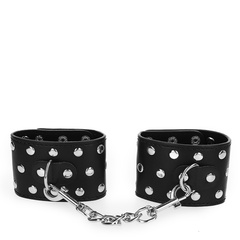 KINK - WRIST RESTRAINTS WITH SNAP CLOSURE FULL OF RIVETS BLACK ADJUSTABLE 19-24CM X 5.5CM